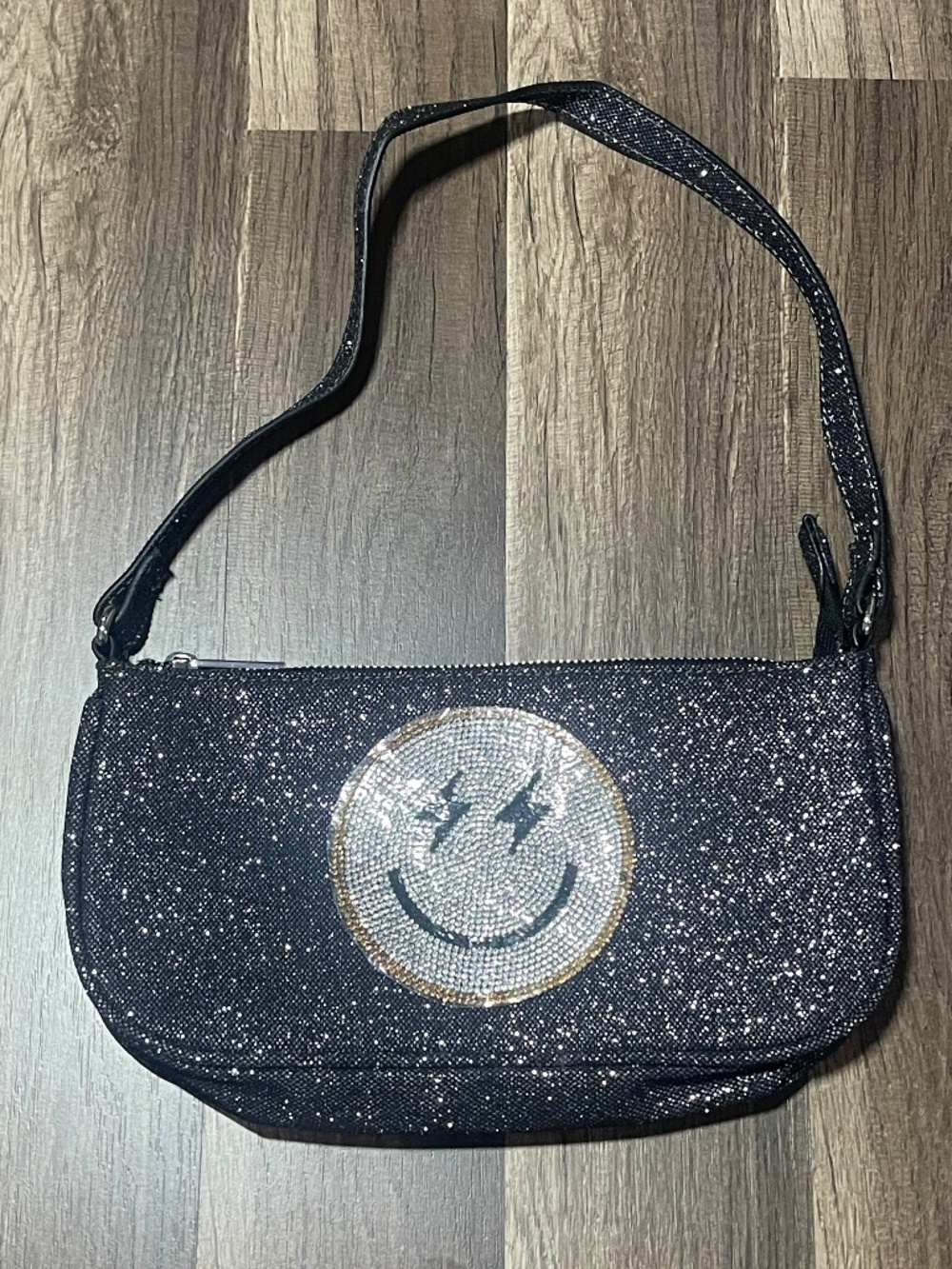 SkinnyDip Smiley Face (Lighting Bolt Eyes) Black Glittery Purse